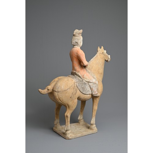 206 - A CHINESE PAINTED POTTERY HORSE WITH MUSICIAN, TANG DYNASTY (618-907). The horse standing four squar... 