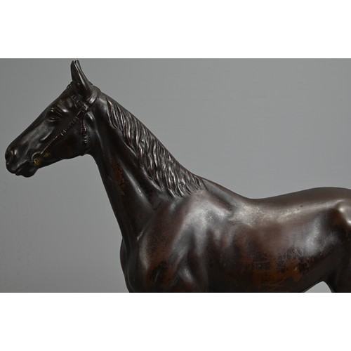 308 - AN EARLY 20TH CENTURY JAPANESE BRONZE MODEL OF A HORSE BY KUNIO ITO (1890-1970).   Modelled standing... 