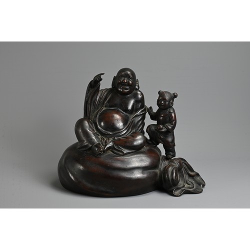 307 - A JAPANESE LATE MEIJI PERIOD (1868-1912) BRONZE OKIMONO OF HOTEI AND KARAKO BY HONMA TAKUSEI III (18... 