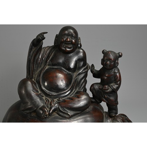 307 - A JAPANESE LATE MEIJI PERIOD (1868-1912) BRONZE OKIMONO OF HOTEI AND KARAKO BY HONMA TAKUSEI III (18... 