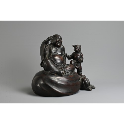 307 - A JAPANESE LATE MEIJI PERIOD (1868-1912) BRONZE OKIMONO OF HOTEI AND KARAKO BY HONMA TAKUSEI III (18... 