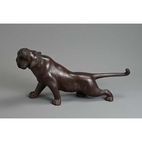 306 - A LATE 19TH/EARLY 20TH CENTURY JAPANESE BRONZE OKIMONO OF A TIGER BY NOBUMITSU. Naturalistically cas... 