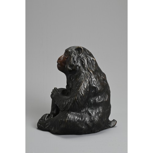 303 - A 20TH CENTURY JAPANESE BRONZE OKIMONO OF A MONKEY BY HIDEYAMA. Naturalistically modelled seated, wi... 