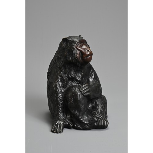 303 - A 20TH CENTURY JAPANESE BRONZE OKIMONO OF A MONKEY BY HIDEYAMA. Naturalistically modelled seated, wi... 