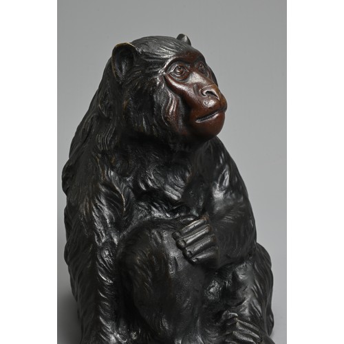 303 - A 20TH CENTURY JAPANESE BRONZE OKIMONO OF A MONKEY BY HIDEYAMA. Naturalistically modelled seated, wi... 