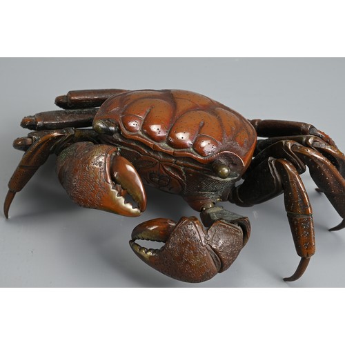 281 - A JAPANESE MEIJI PERIOD (1868-1912) BRONZE JIZAI OKIMONO OF A CRAB. With articulated legs, claws and... 