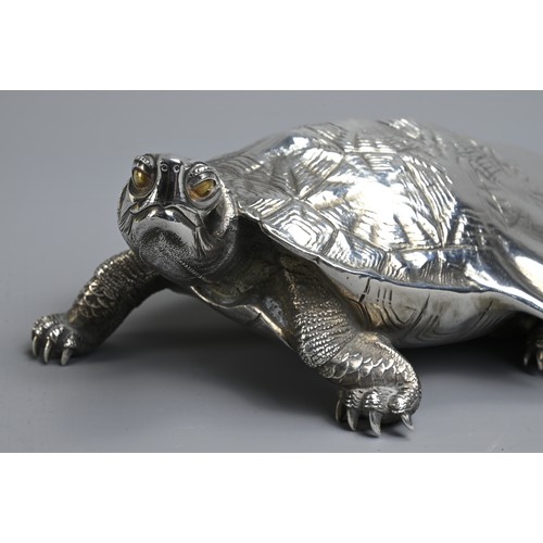 284 - A 20TH CENTURY JAPANESE SILVER OKIMONO OF A MINOGAME. The mythical turtle depicted with a typical lo... 