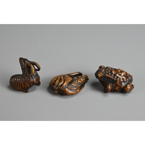 279 - THREE 19TH CENTURY JAPANESE CARVED BOXWOOD NETSUKE. Comprising: a model of a goat, signed Kokei (Kuw... 