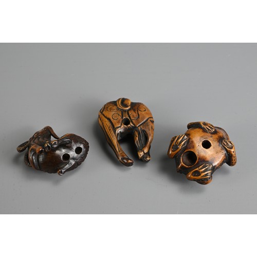 279 - THREE 19TH CENTURY JAPANESE CARVED BOXWOOD NETSUKE. Comprising: a model of a goat, signed Kokei (Kuw... 