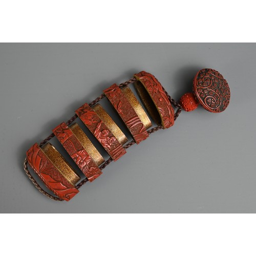 276 - A JAPANESE MEIJI PERIOD (1868-1912) RED LACQUER INRO. With red lacquer manju netsuke and ojime ensem... 