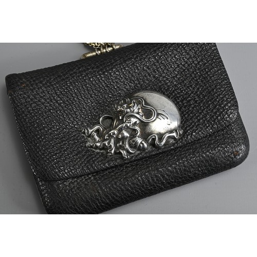 278 - A JAPANESE MEIJI PERIOD (1868-1912) BLACK LEATHER COIN POUCH (FUKURO) WITH SILVER-COLOURED METAL CLA... 