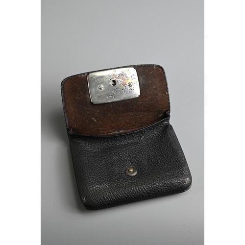 278 - A JAPANESE MEIJI PERIOD (1868-1912) BLACK LEATHER COIN POUCH (FUKURO) WITH SILVER-COLOURED METAL CLA... 