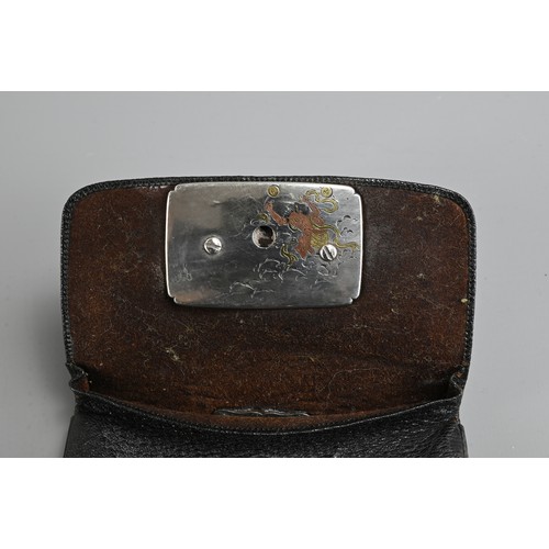 278 - A JAPANESE MEIJI PERIOD (1868-1912) BLACK LEATHER COIN POUCH (FUKURO) WITH SILVER-COLOURED METAL CLA... 