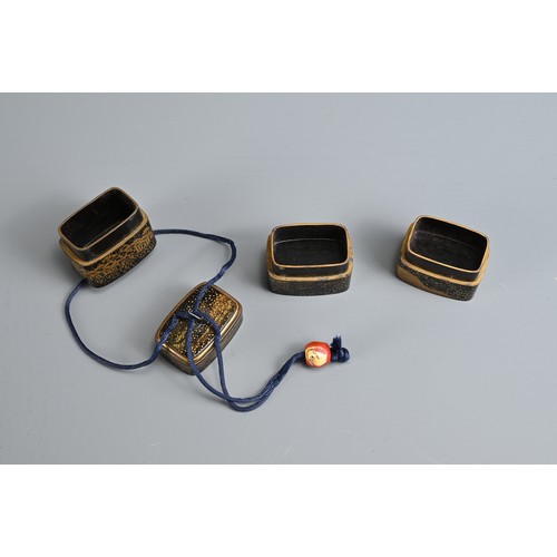 275 - A JAPANESE MEIJI PERIOD (1868-1912) GOLD AND BLACK LACQUER INRO
Of rectangular form, in four section... 