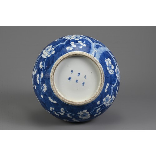 49 - A CHINESE BLUE AND WHITE PORCELAIN PRUNUS BOTTLE VASE, 19TH CENTURY. With globular body and flared n... 