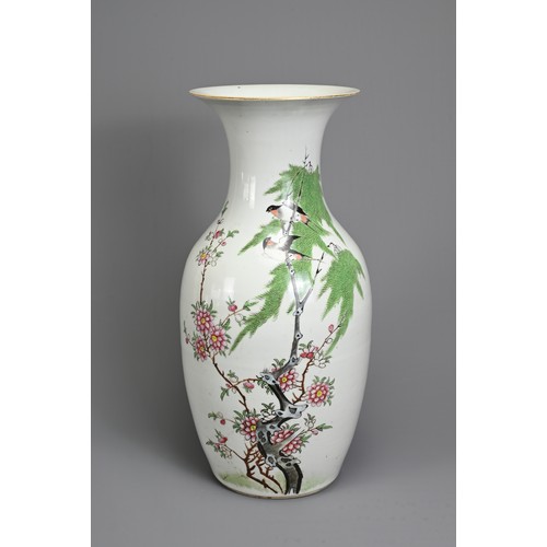 52 - A CHINESE FAMILLE ROSE PORCELAIN VASE, 20TH CENTURY. Of baluster form decorated with birds perched i... 