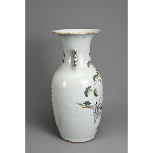 53 - A CHINESE FAMILLE ROSE PORCELAIN VASE, 20TH CENTURY. Of baluster form with pierced gilt handles, dec... 