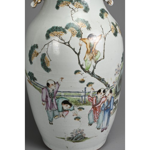 53 - A CHINESE FAMILLE ROSE PORCELAIN VASE, 20TH CENTURY. Of baluster form with pierced gilt handles, dec... 