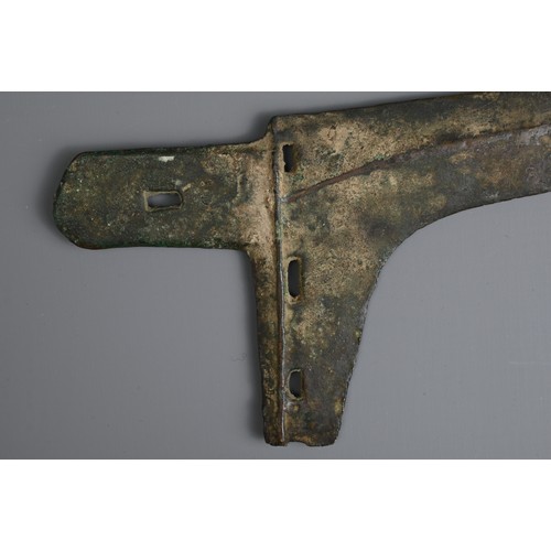 209 - A CHINESE ARCHAIC BRONZE CEREMONIAL DAGGER, GE, WARRING STATES PERIOD (476-221BC). With four pierced... 