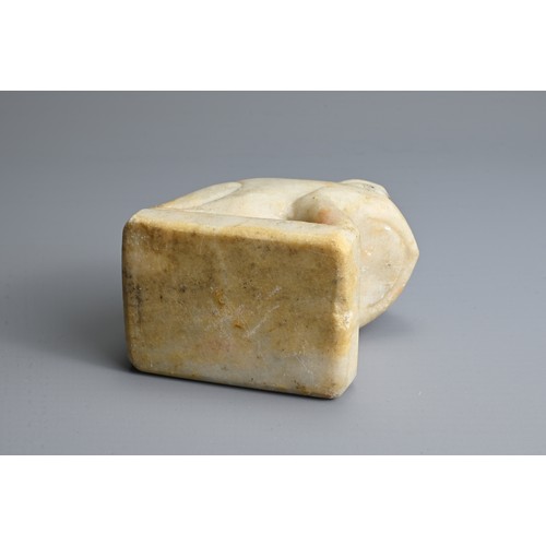 212 - A CHINESE WHITE MABLE MODEL OF A FROG, TANG DYNASTY OR LATER. Seated on a rectangular base with blac... 