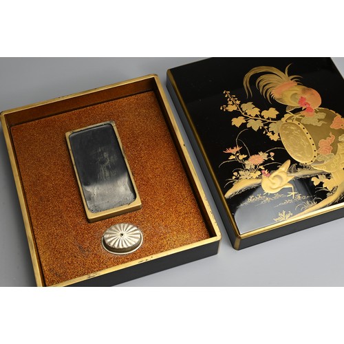 295 - A JAPANESE EARLY 20TH CENTURY, LACQUER WRITING BOX (SUZURIBAKO).  Decorated with gold, silver and re... 