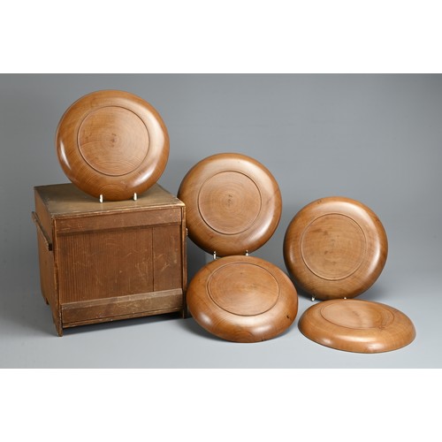 299 - FIVE 20TH CENTURY JAPANESE SENCHA (TEA CEREMONY) CARVED WOODEN CIRCULAR TRAYS. Each carved with a di... 