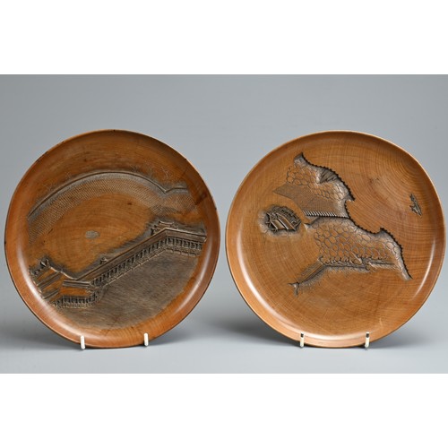 299 - FIVE 20TH CENTURY JAPANESE SENCHA (TEA CEREMONY) CARVED WOODEN CIRCULAR TRAYS. Each carved with a di... 