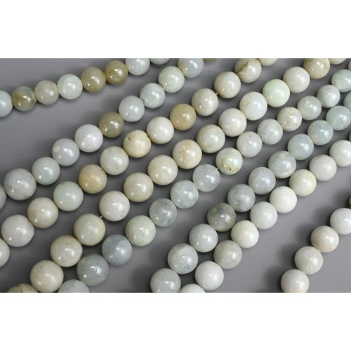 117 - FOUR STRINGS OF JADE JADEITE BEADS, BURMESE. Circular beads of graduating sizes in pale to dark gree... 