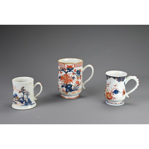 1 - THREE CHINESE IMARI PORCELAIN TANKARDS, 18TH CENTURY. Of varying sizes decorated with coastal and fl... 