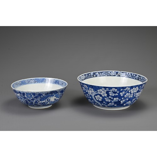 23 - TWO CHINESE BLUE AND WHITE PORCELAIN BOWLS, 19TH CENTURY. To include a large punch bowl decorated wi... 