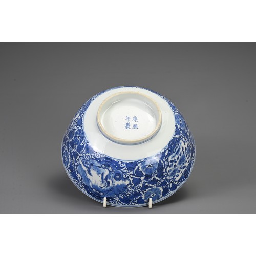 23 - TWO CHINESE BLUE AND WHITE PORCELAIN BOWLS, 19TH CENTURY. To include a large punch bowl decorated wi... 