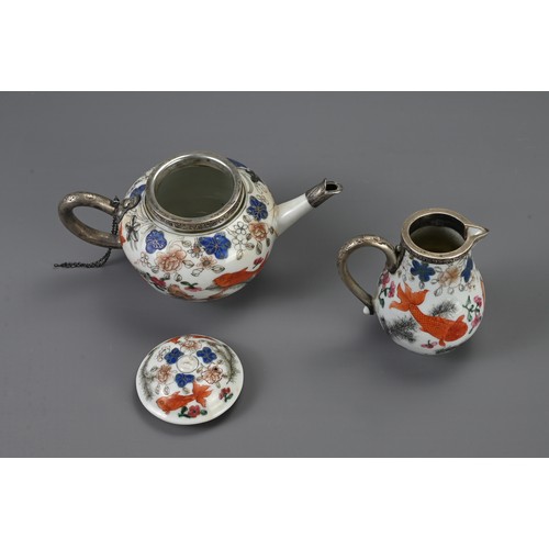 26 - A CHINESE FAMILLE ROSE EXPORT PORCELAIN TEAPOT AND MILK JUG, 18TH CENTURY. Decorated with goldfish a... 