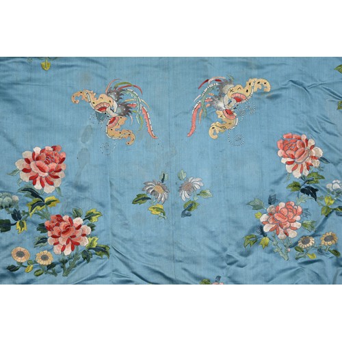 190 - TWO CHINESE EMBROIDERED BLUE GROUND SILK ROBES, CIRCA 1900 AND LATER. The first, earlier example, of... 