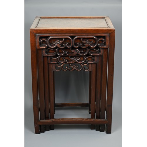 204 - A NEST OF FOUR CHINESE ROSEWOOD AND BURR WALNUT TABLES, EARLY 20TH CENTURY. Of rectangular form with... 