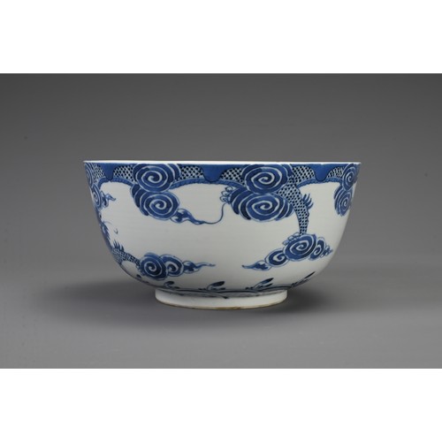 27 - THREE CHINESE BLUE AND WHITE PORCELAIN BOWLS, 18/19TH CENTURY. The largest decorated with carp and w... 