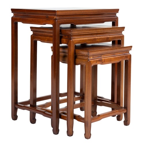 206 - A CHINESE HARDWOOD NEST OF TABLES, 20TH CENTURY. of rectangular form with stretcher legs. Largest ta... 