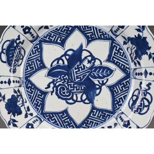 35 - A LARGE CHINESE BLUE AND WHITE KRAAK TYPE PORCELAIN DISH, 17/18TH CENTURY. A deep dish with everted ... 