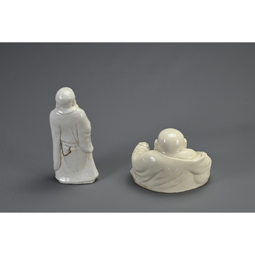 37 - TWO CHINESE BLANC DE CHINE FIGURES, 18/19TH CENTURY. To include a figure of Buddha stood dressed in ... 