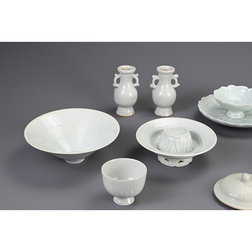 40 - A GROUP OF CHINESE QINGBAI WARE, SONG / YUAN DYNASTY STYLE BUT LATER. To include a cup stand and cup... 