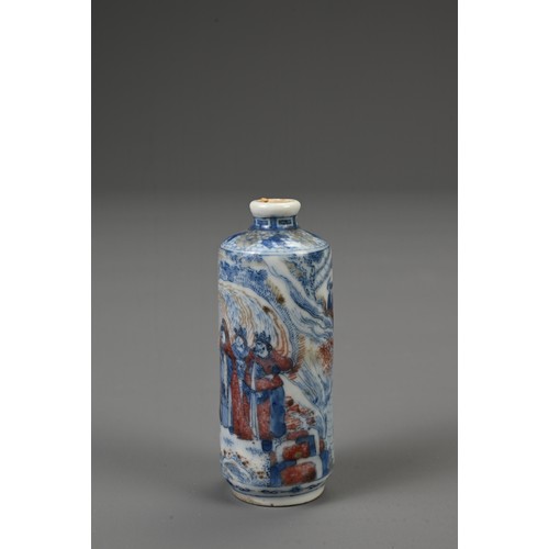 54 - A CHINESE UNDERGLAZE BLUE AND COPPER RED PORCELAIN SNUFF BOTTLE, 19TH CENTURY. Of cylindrical form d... 