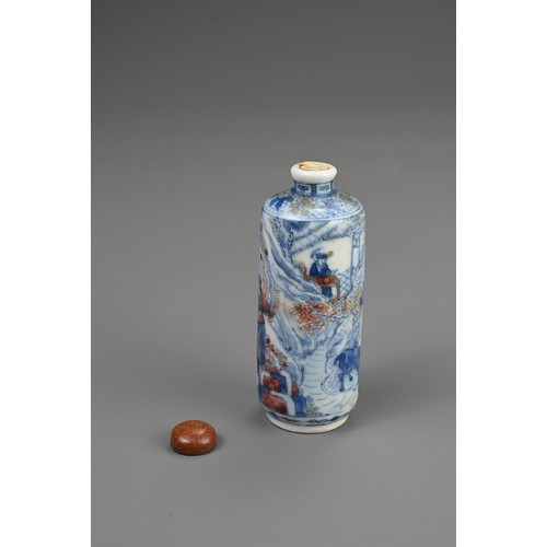 54 - A CHINESE UNDERGLAZE BLUE AND COPPER RED PORCELAIN SNUFF BOTTLE, 19TH CENTURY. Of cylindrical form d... 