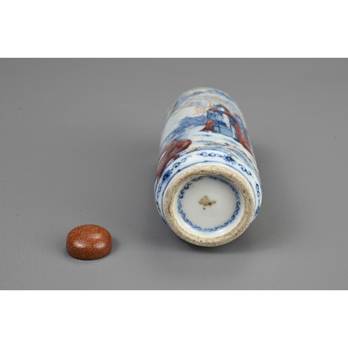 54 - A CHINESE UNDERGLAZE BLUE AND COPPER RED PORCELAIN SNUFF BOTTLE, 19TH CENTURY. Of cylindrical form d... 