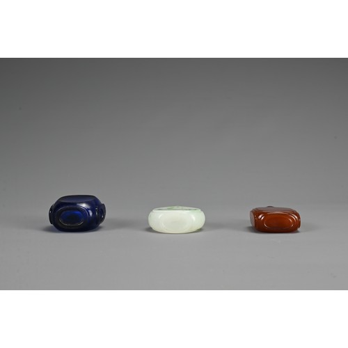 57 - THREE CHINESE GLASS SNUFF BOTTLES, 19/20TH CENTURY. To include a square form opaque orange glass bot... 