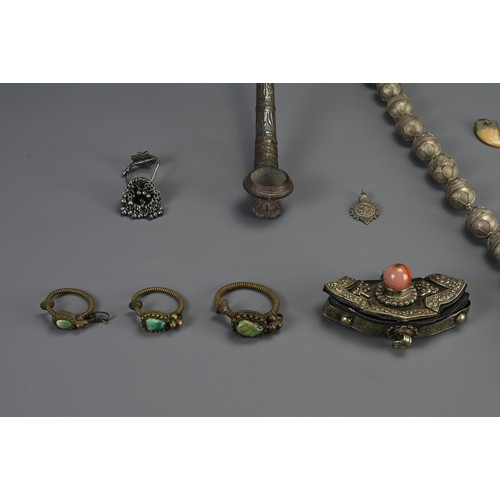 67 - A GROUP OF TURKMAN, TIBETAN, HILL TRIBE ITEMS, 20TH CENTURY. To include an ethnic metalware beaded n... 