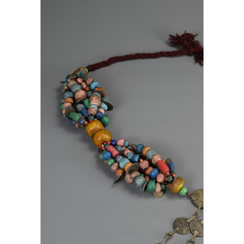 68 - A LARGE MOROCCAN BERBER NECKLACE, 20TH CENTURY. Strung with various coloured ceramic and glass beads... 