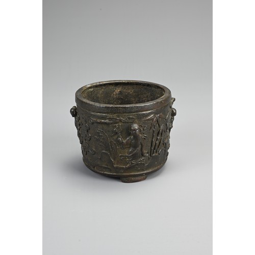 76 - A CHINESE BRONZE TRIPOD CENSER, EARLY 20TH CENTURY. Of circular form with three handles decorated in... 