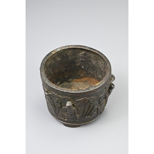 76 - A CHINESE BRONZE TRIPOD CENSER, EARLY 20TH CENTURY. Of circular form with three handles decorated in... 