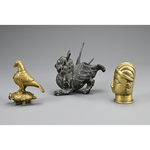 74 - A GROUP OF INDIAN / ASIAN METAL WARE ITEMS, 20TH CENTURY. To include a bronze model of a head; A bro... 