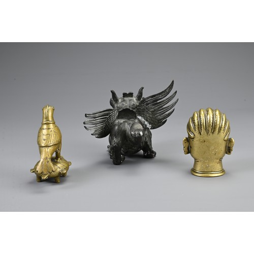 74 - A GROUP OF INDIAN / ASIAN METAL WARE ITEMS, 20TH CENTURY. To include a bronze model of a head; A bro... 