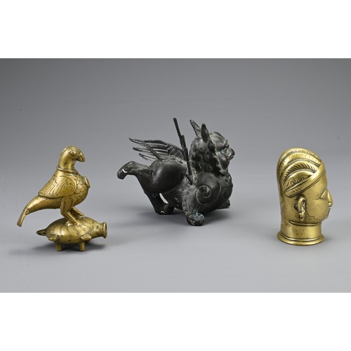 74 - A GROUP OF INDIAN / ASIAN METAL WARE ITEMS, 20TH CENTURY. To include a bronze model of a head; A bro... 